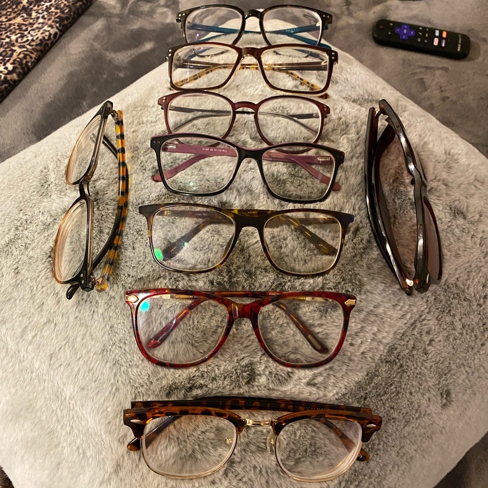 9 pairs of eye glasses